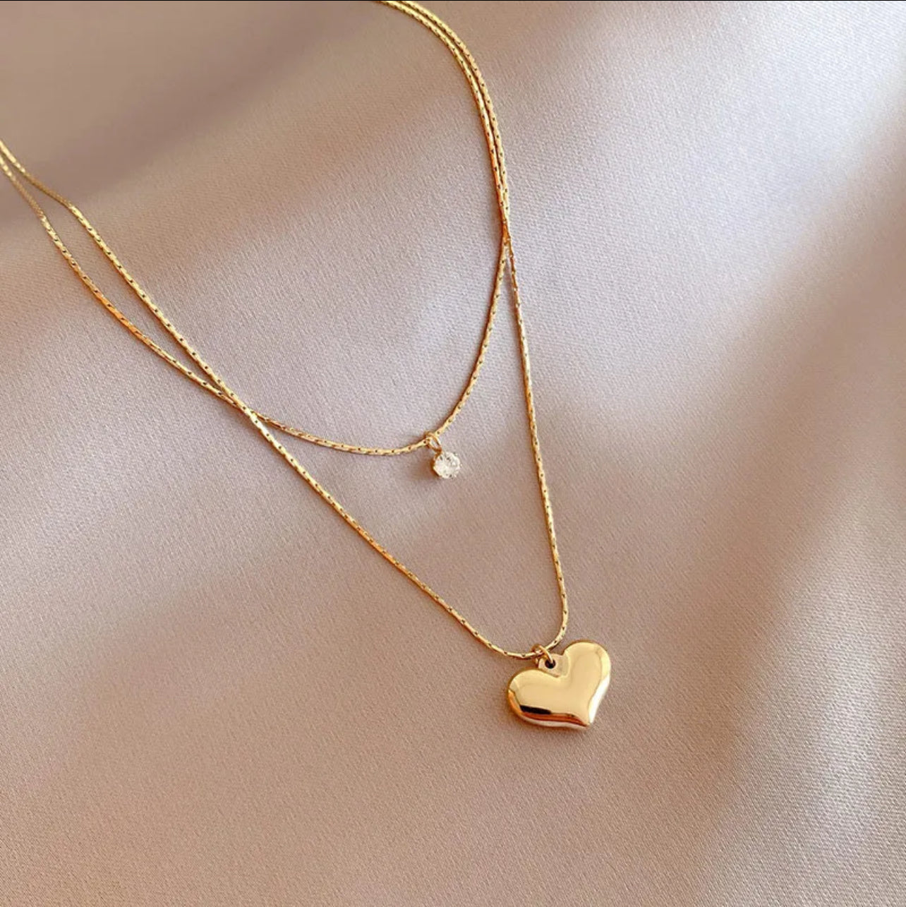Cadena doble de corazón y brillito