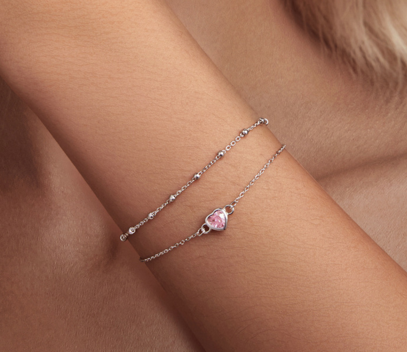 Pulsera doble corazón rosa