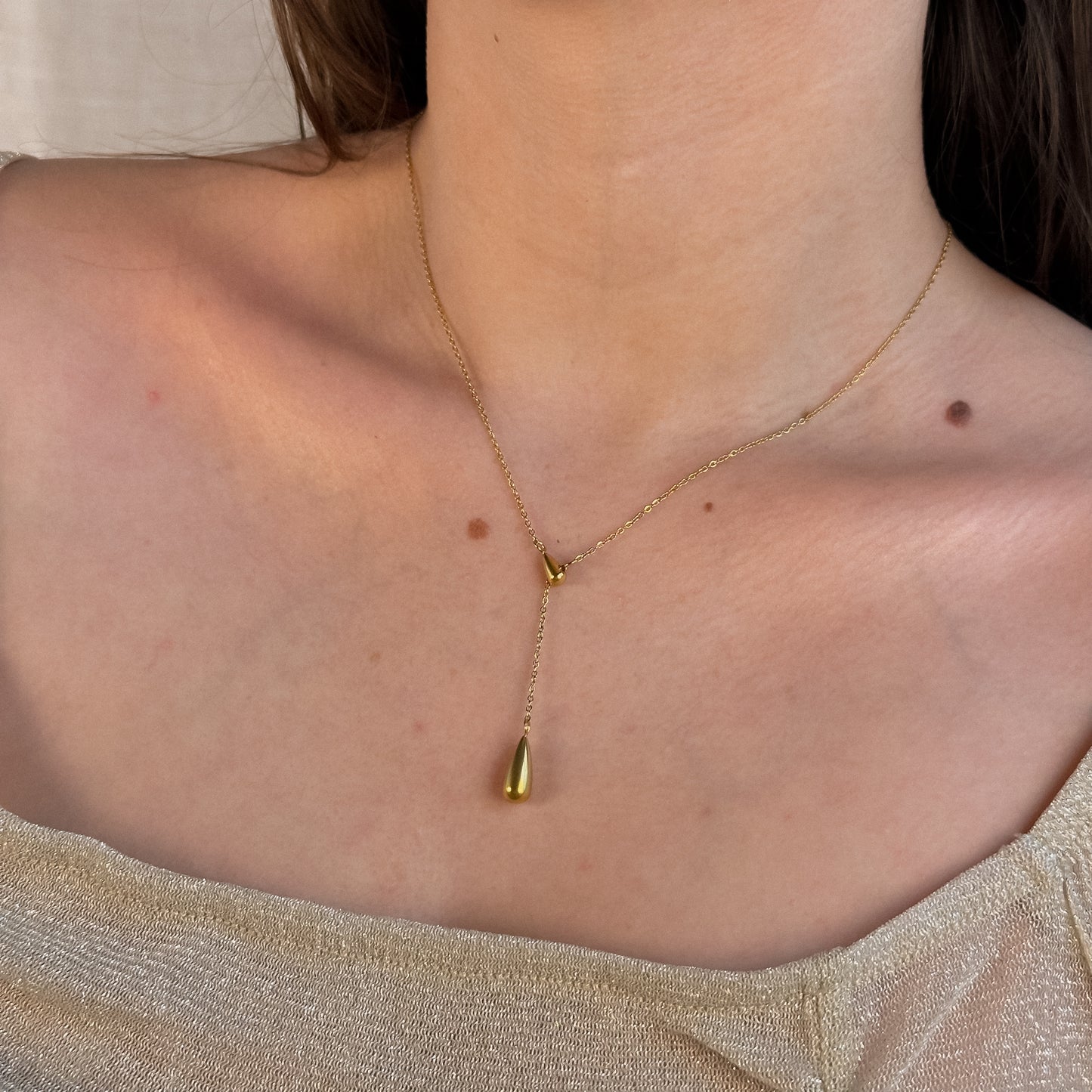 Cadena de escote dos gotas