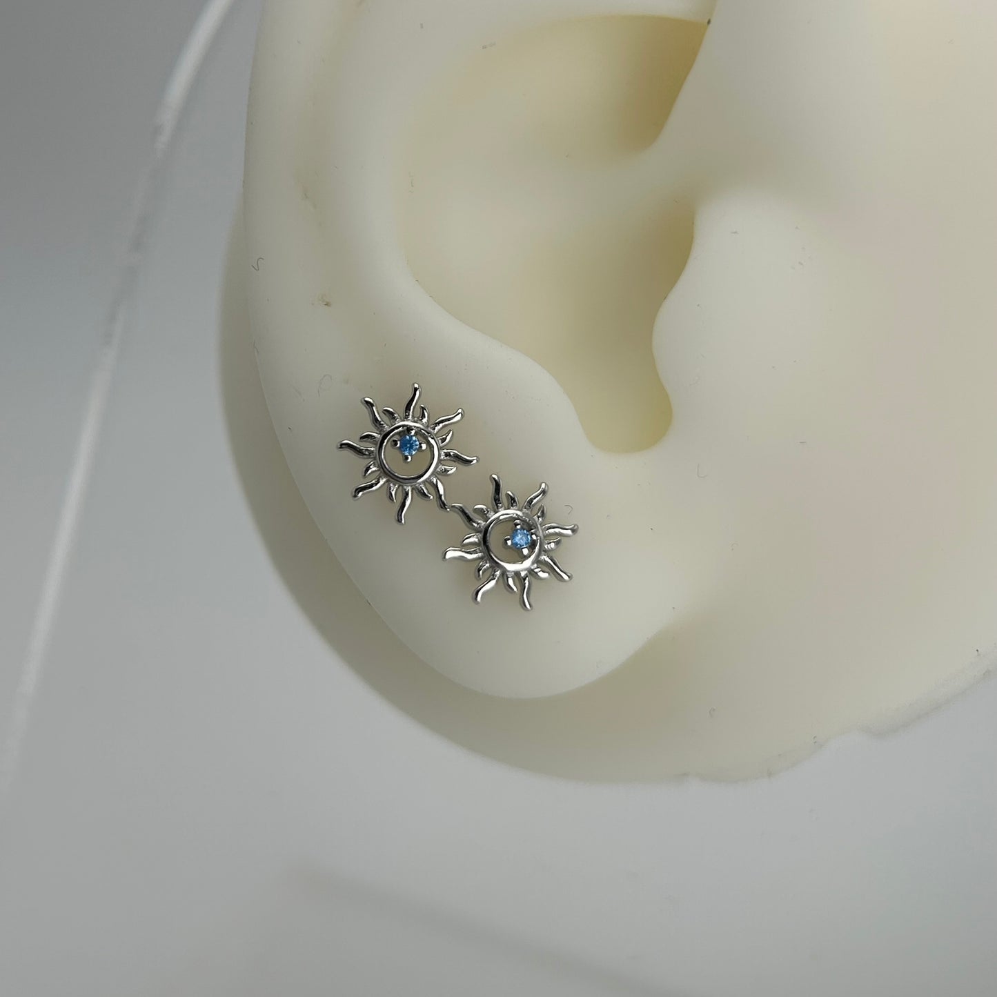 Piercing de sol piedra azul