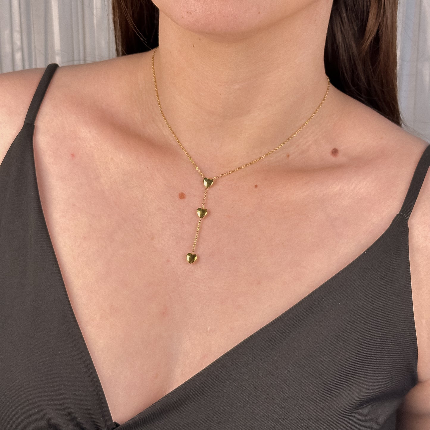 Cadena de escote de corazones