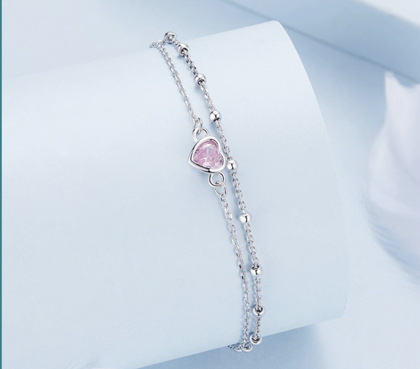 Pulsera doble corazón rosa