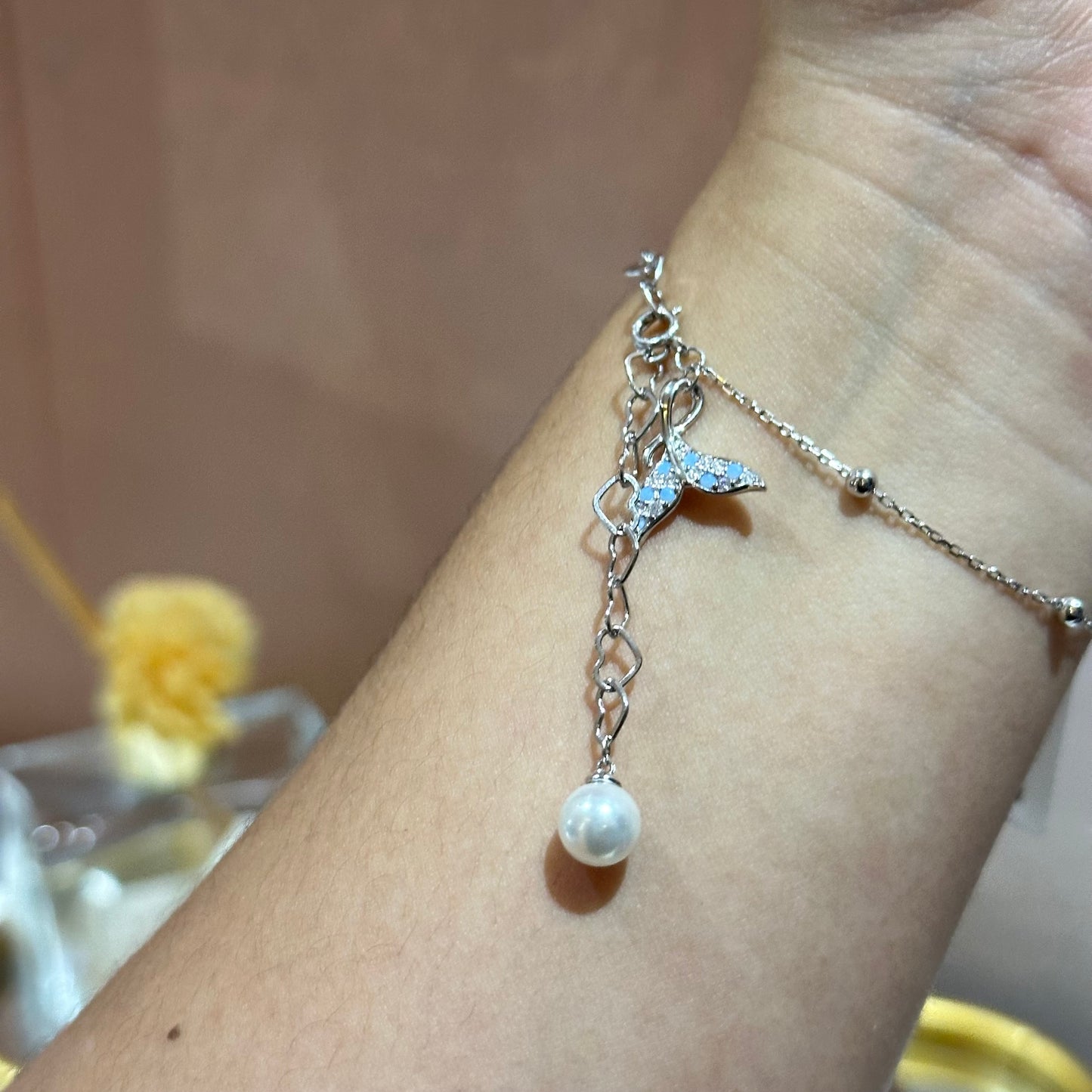 Pulsera cola y perla