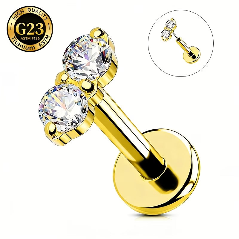 Titanio Flat Back dos zirconias dorado