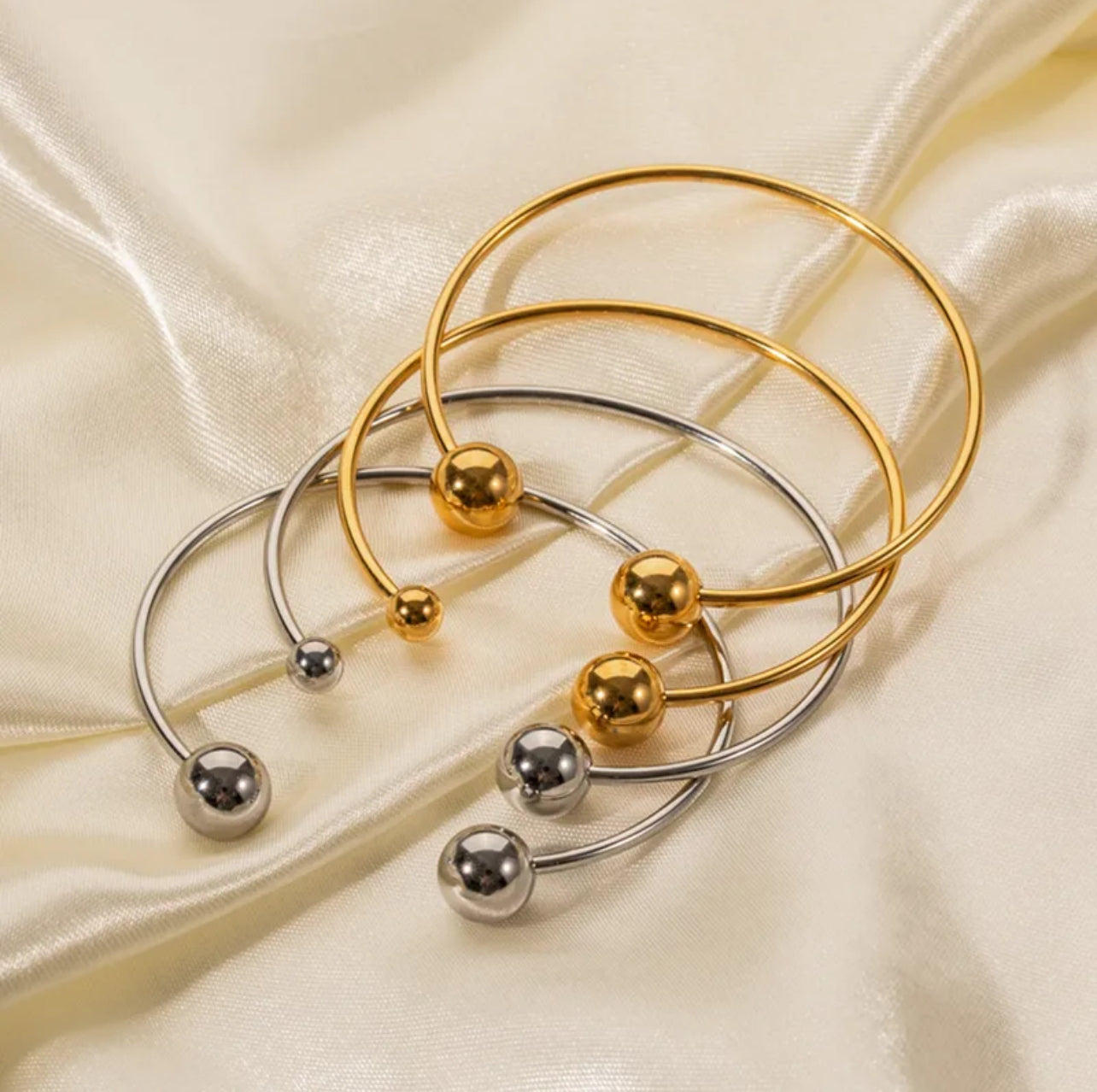 Bangle de dos bolas