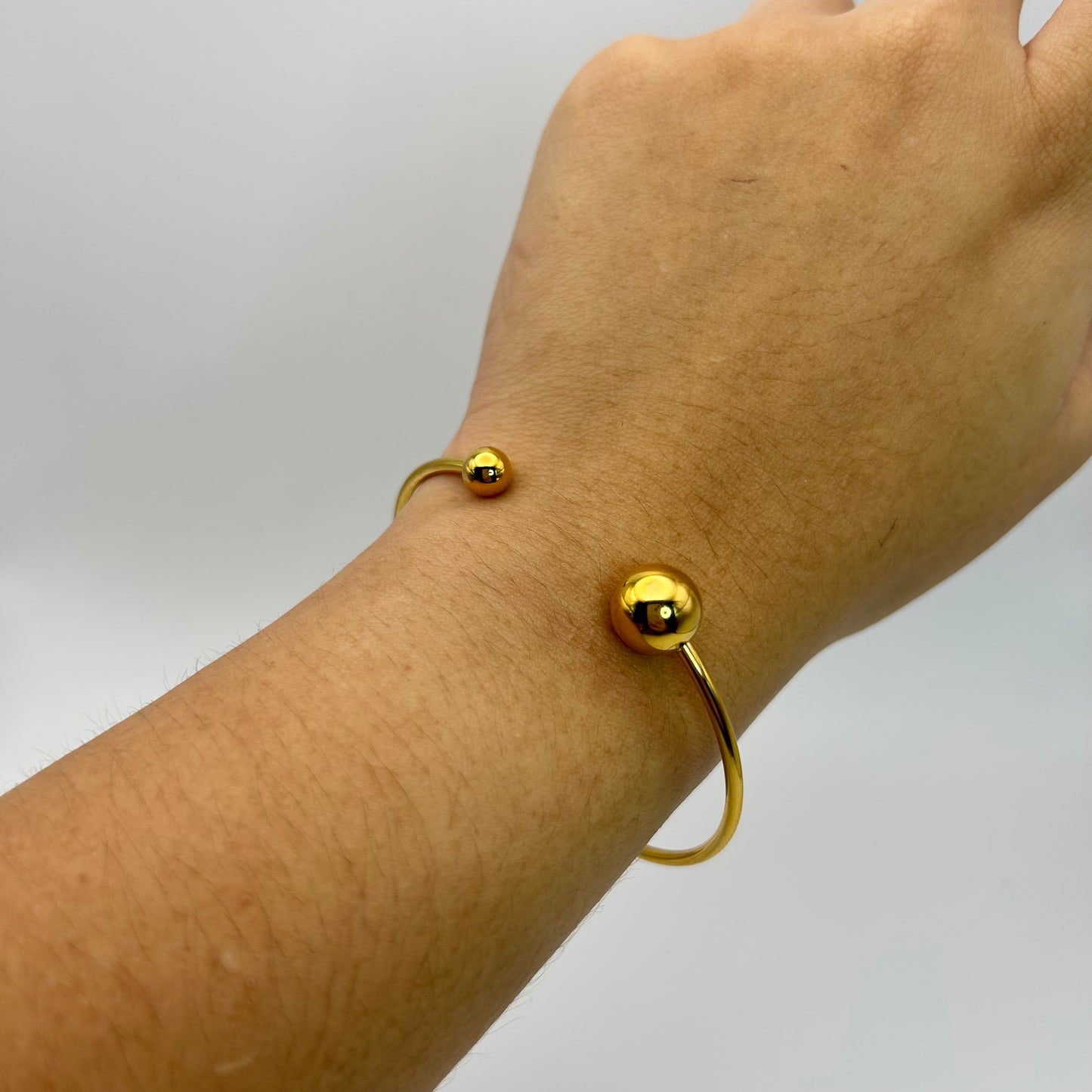 Bangle de dos bolas