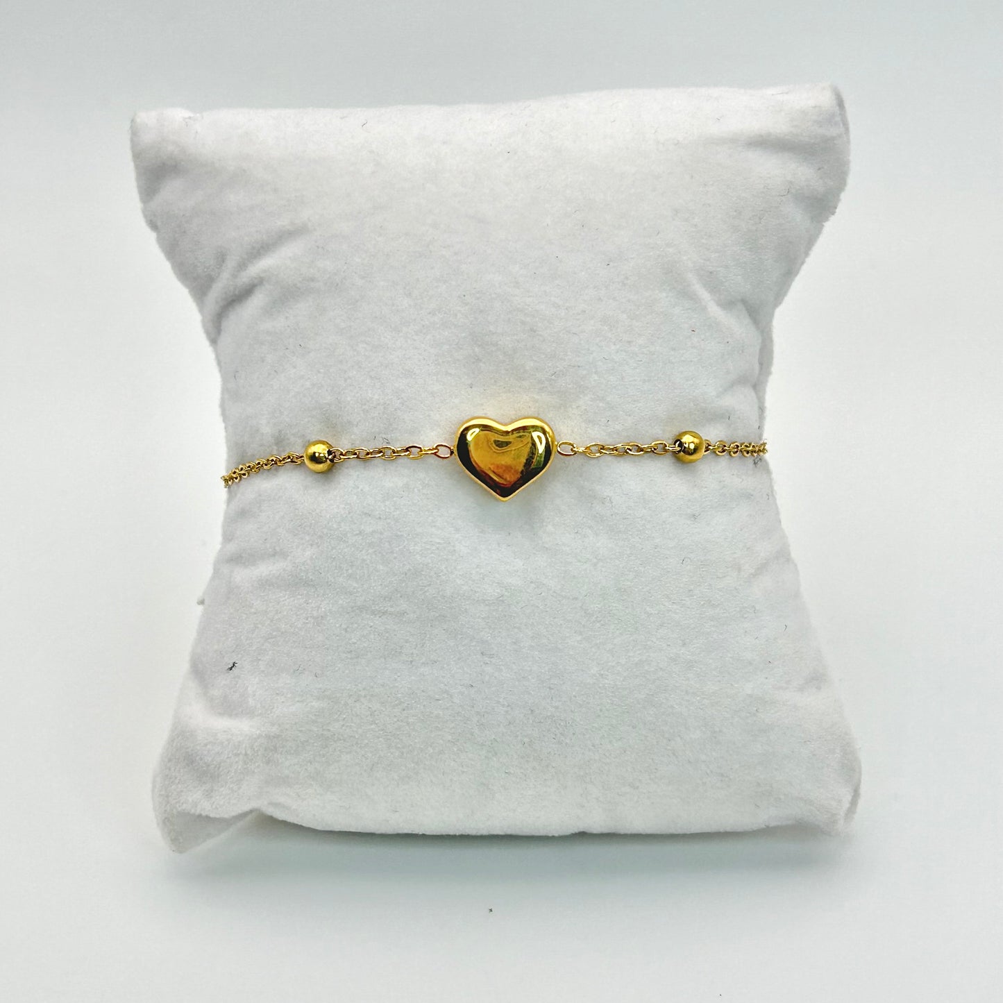 Pulsera de corazón con balines