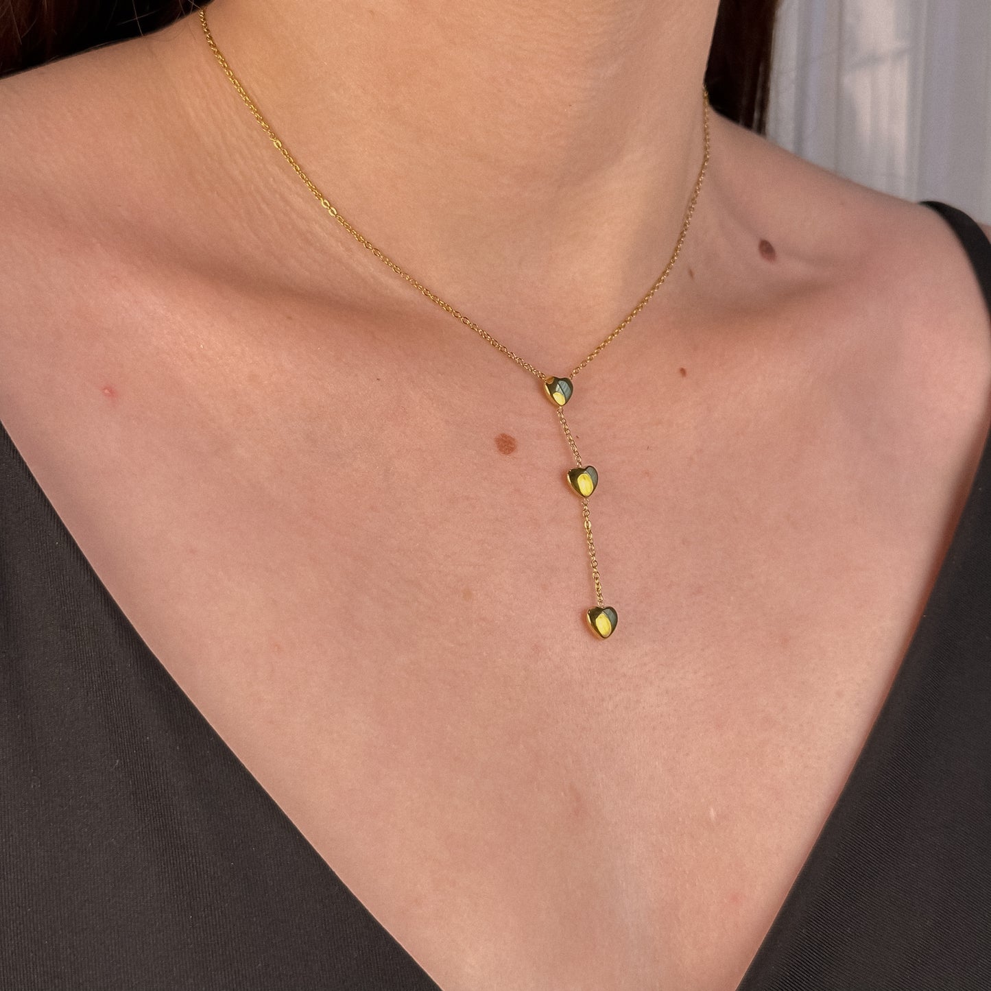 Cadena de escote de corazones