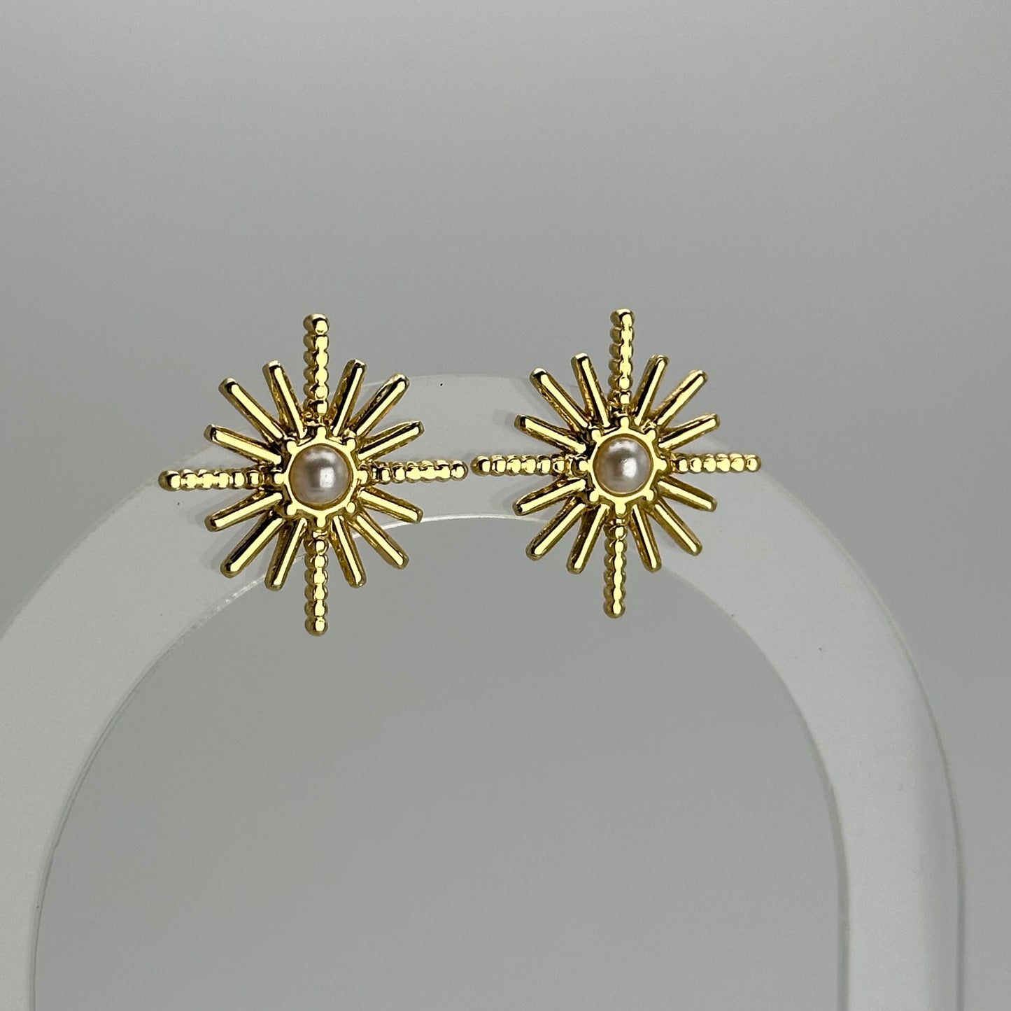 Stud destello con perla