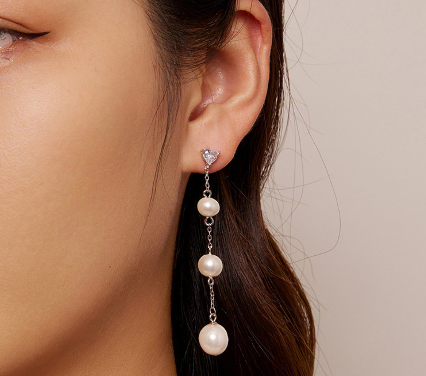 Aretes una zirconias 3 perlas colgantes