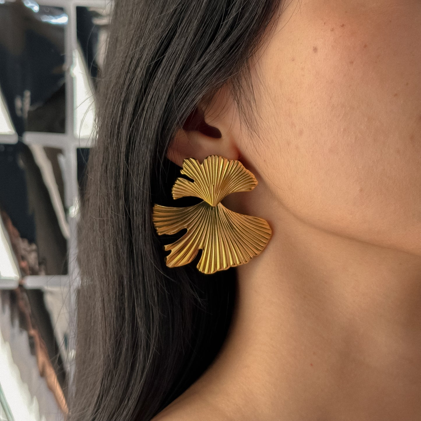 Aretes de abanico