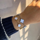 Pulsera trébol color blanco