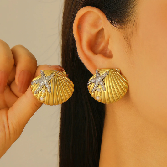 Aretes concha con estrella