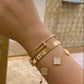 Pulsera trébol color blanco