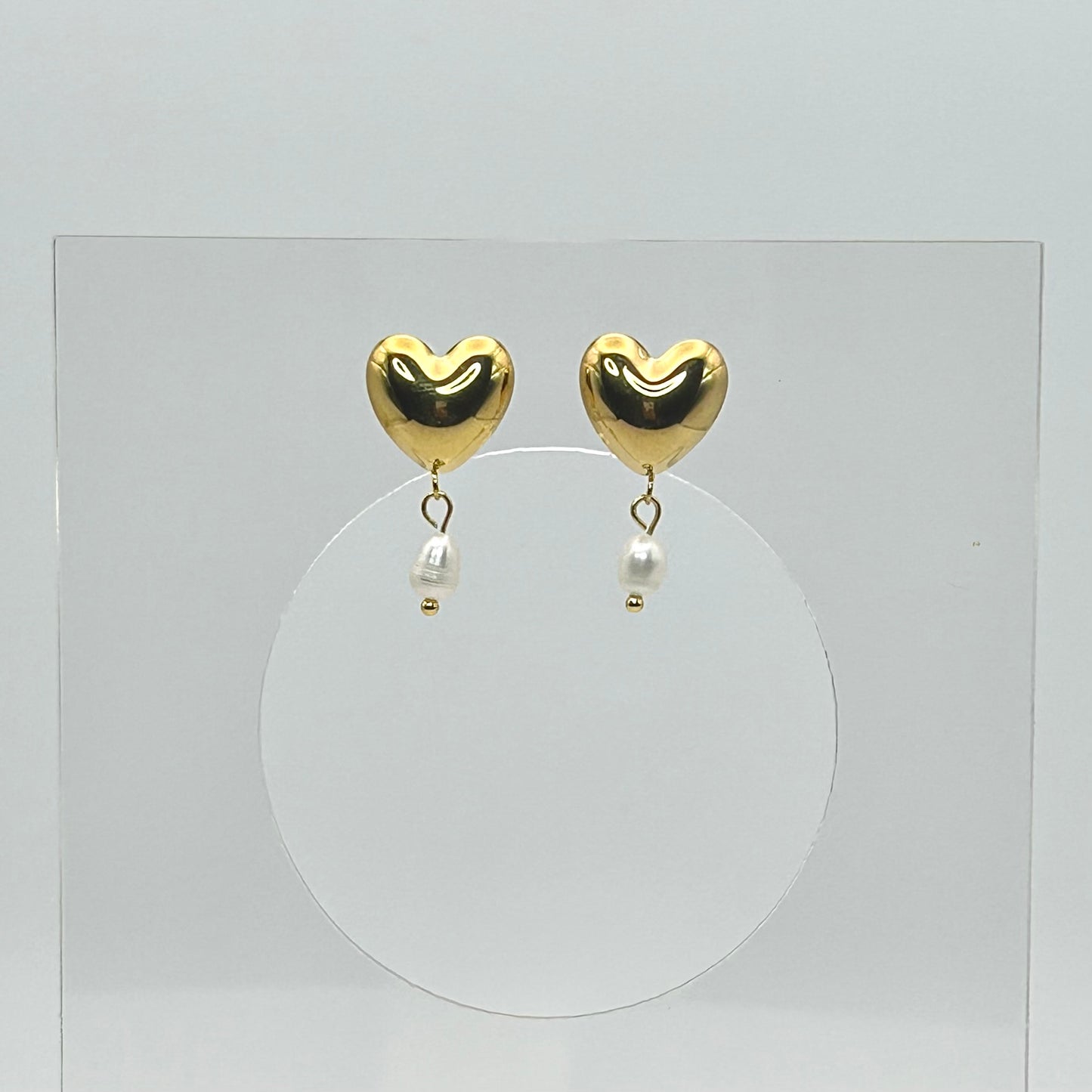 Aretes de corazón con perla