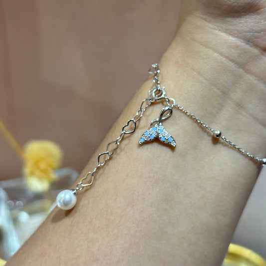 Pulsera cola y perla