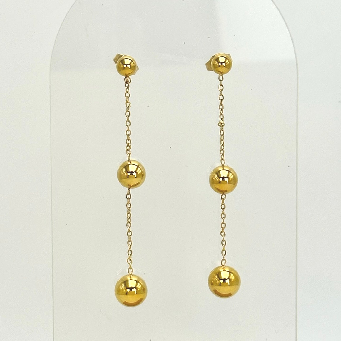 Aretes de tres bolitas