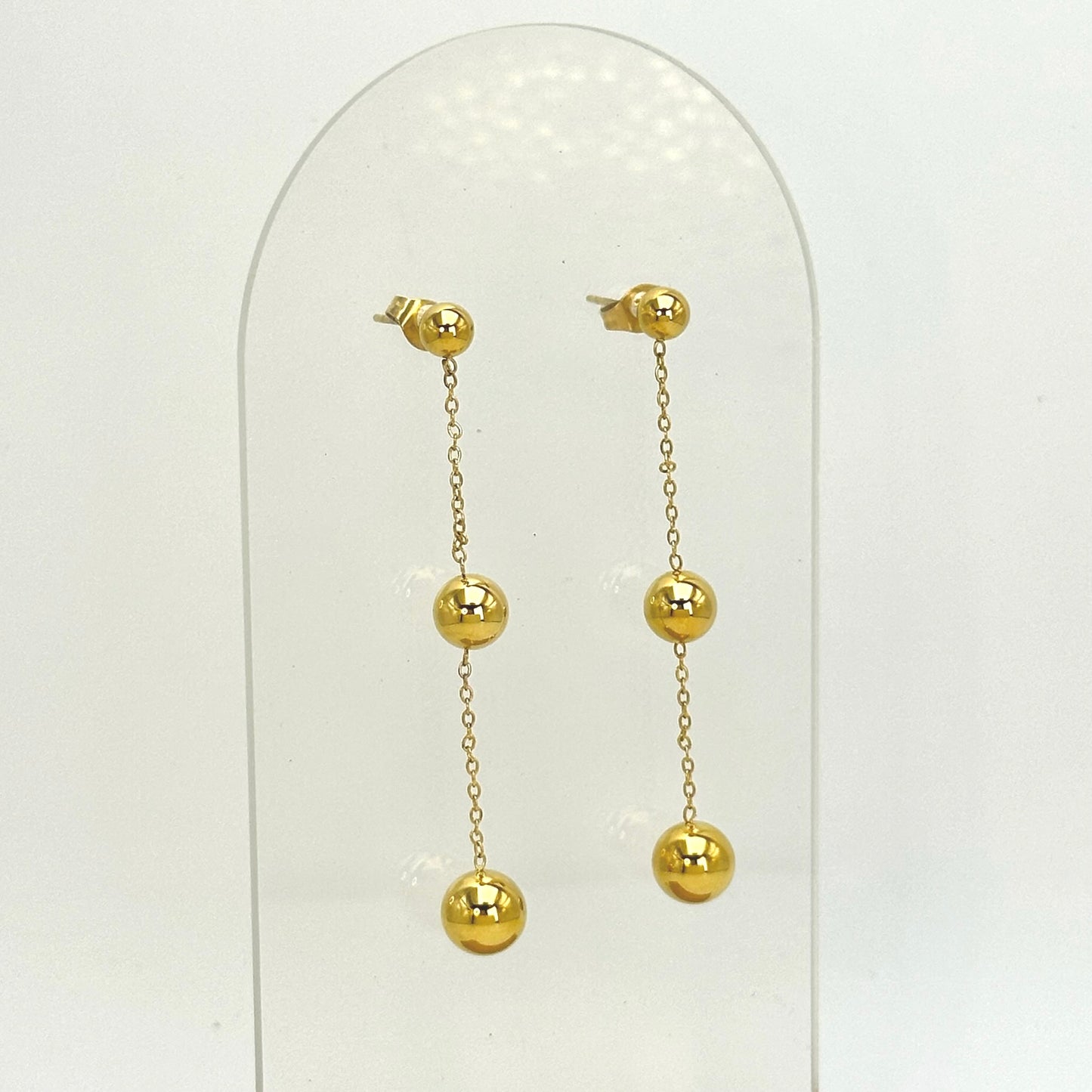 Aretes de tres bolitas