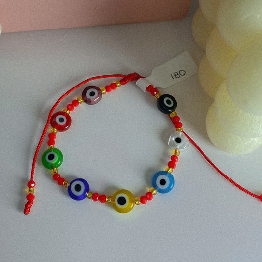 Pulsera de ojos turcos multicolor en hilo
