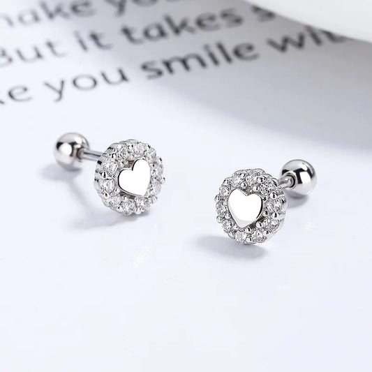 Piercing de plata corazón con borde de zirconia plateado 🤍