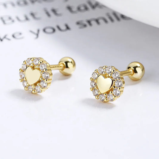 Piercing de plata corazón con borde de zirconia dorado 💛